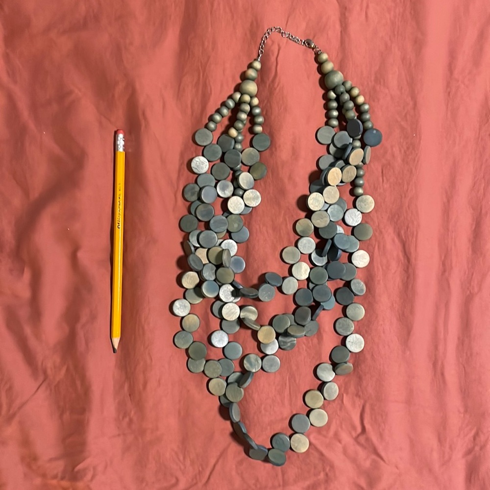 Wood diecut cool grey loop necklace with lobster clasp.